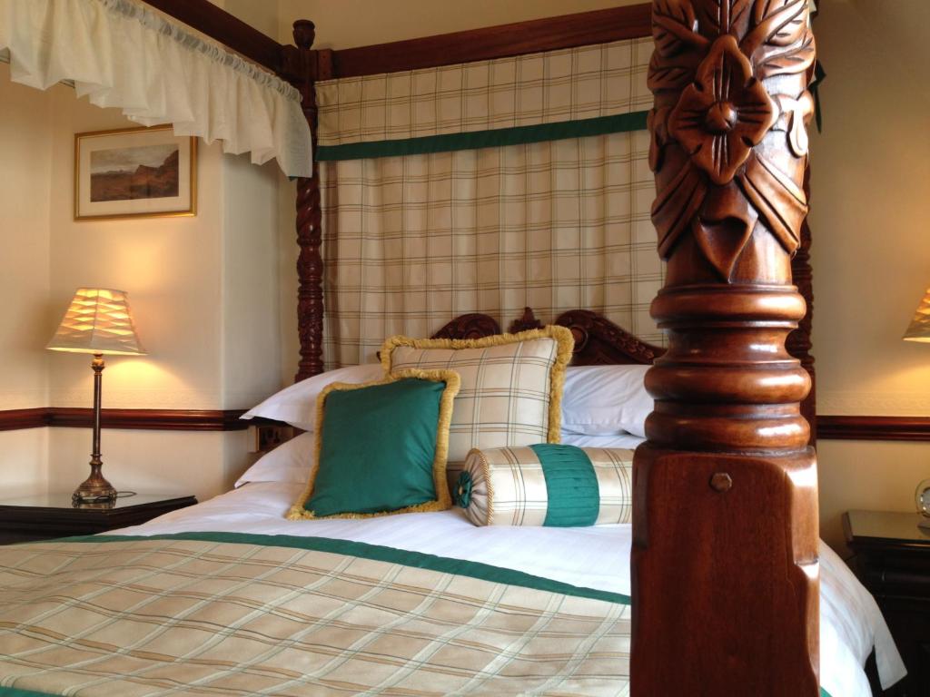 Postel nebo postele na pokoji v ubytování AmarAgua Guest house