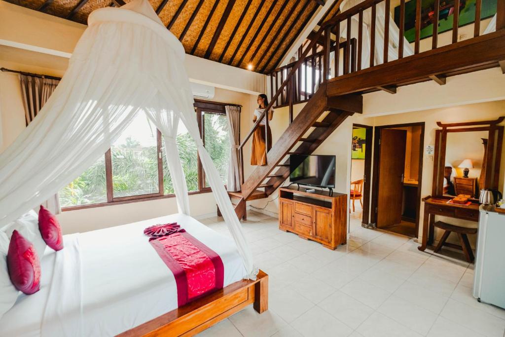 TV a/nebo společenská místnost v ubytování Sri Aksata Ubud Resort
