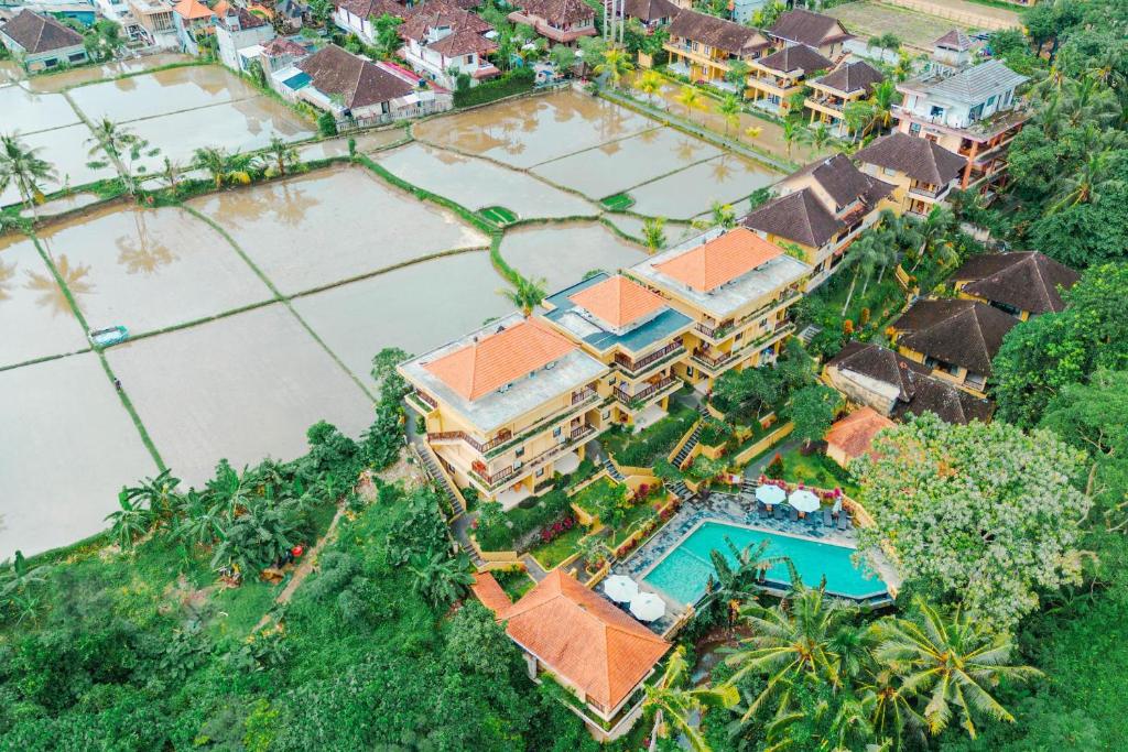 an aerial view of a villa with a swimming pool at Sri Aksata Ubud Resort in Ubud