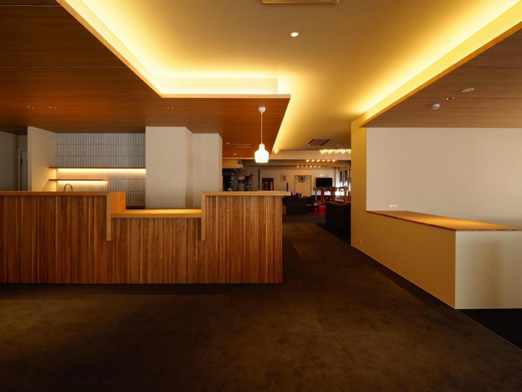 Kuchyň nebo kuchyňský kout v ubytování Hotel Sanraku