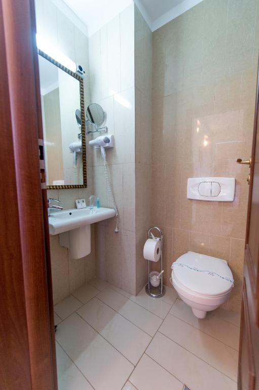 Koupelna v ubytování Hotel Rexton