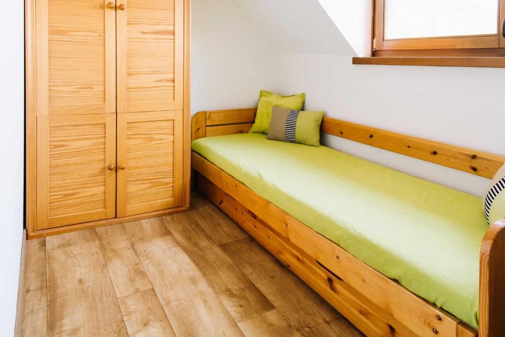 Postel nebo postele na pokoji v ubytování Diófa Apartman