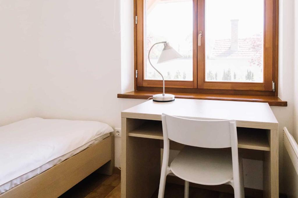 Postel nebo postele na pokoji v ubytování Diófa Apartman