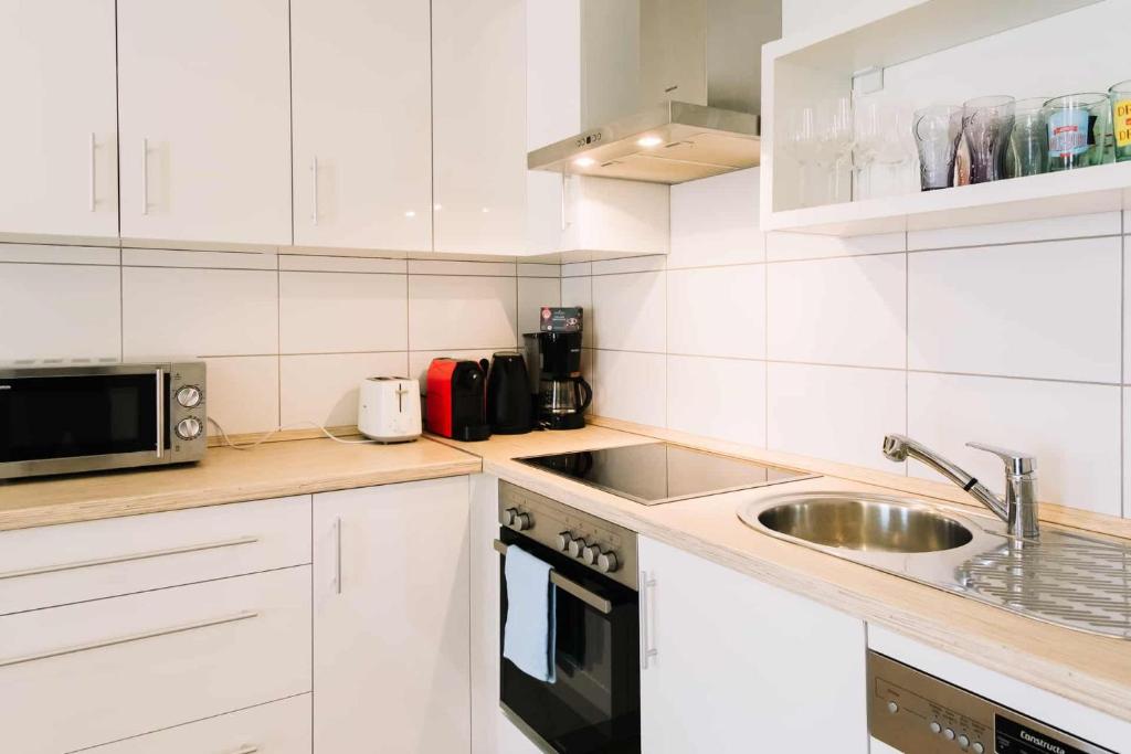 Kuchyň nebo kuchyňský kout v ubytování Diófa Apartman