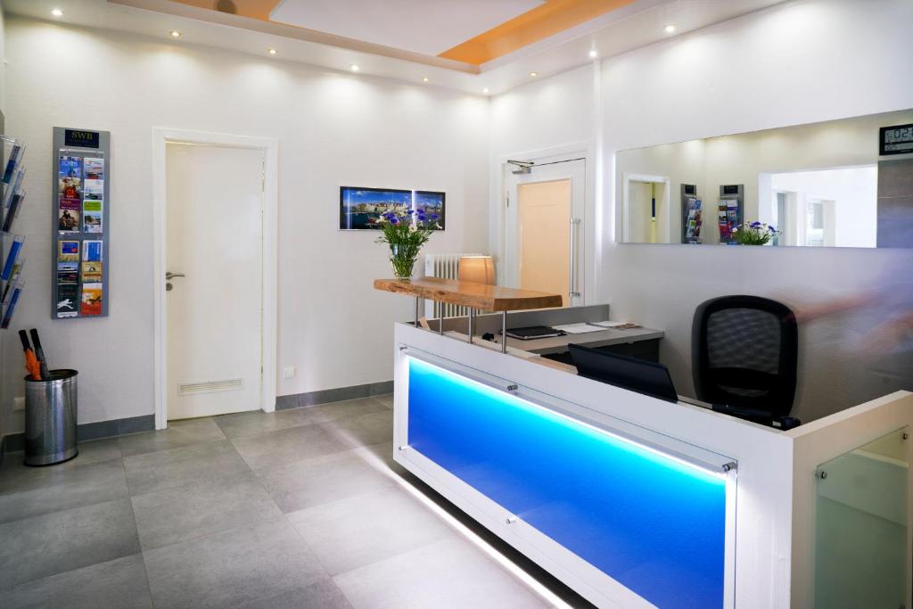TV a/nebo společenská místnost v ubytování Hotel Am Mühlenteich