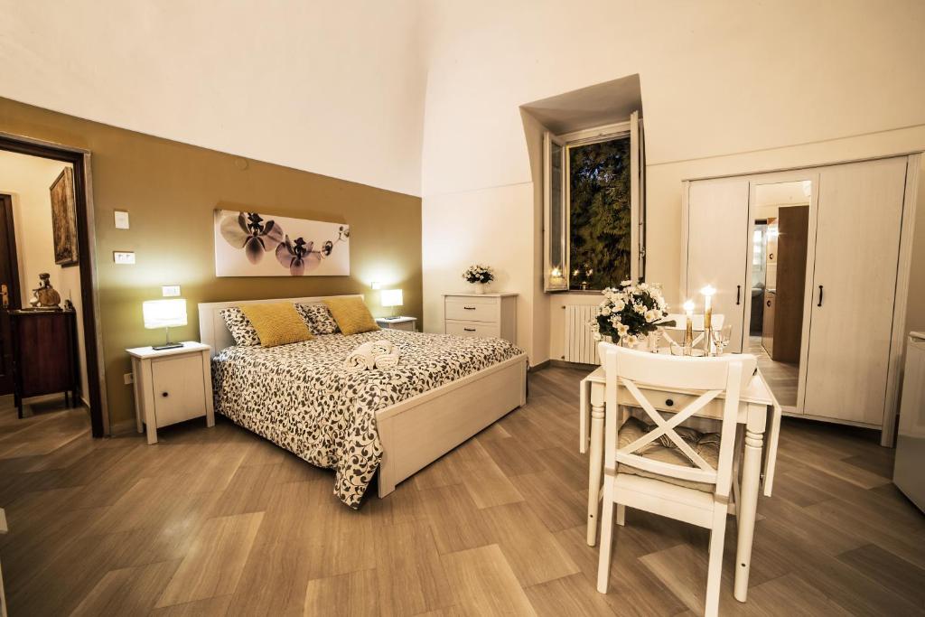 Posteľ alebo postele v izbe v ubytovaní B&B Germinario