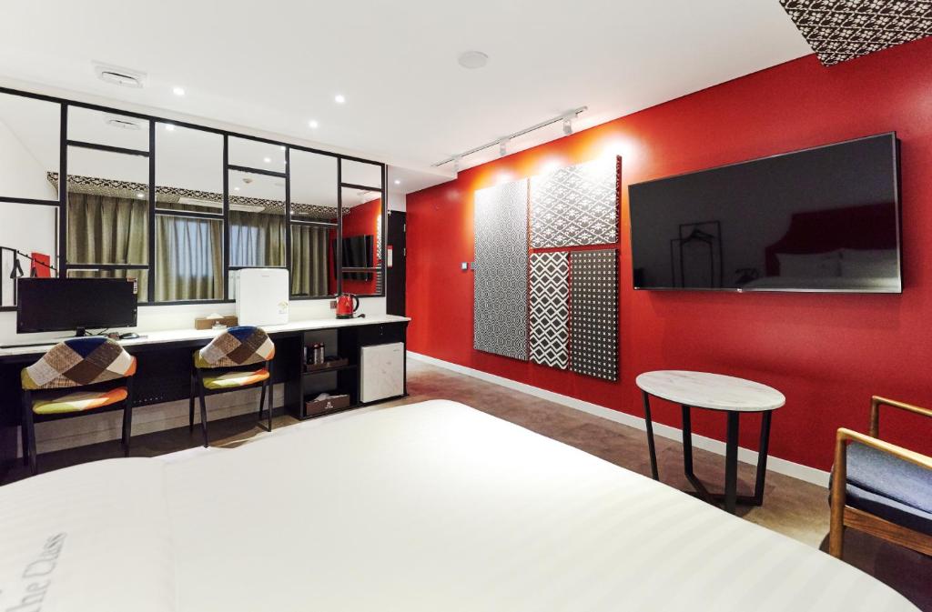 TV a/nebo společenská místnost v ubytování Hotel The Class
