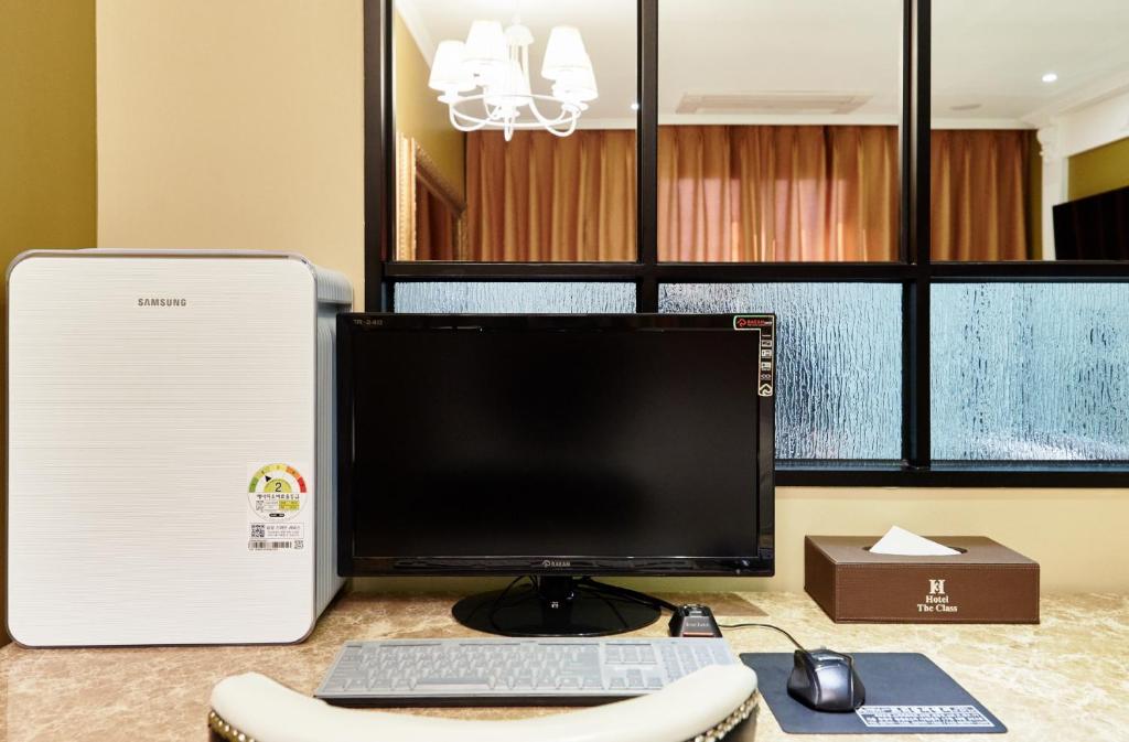 TV a/nebo společenská místnost v ubytování Hotel The Class
