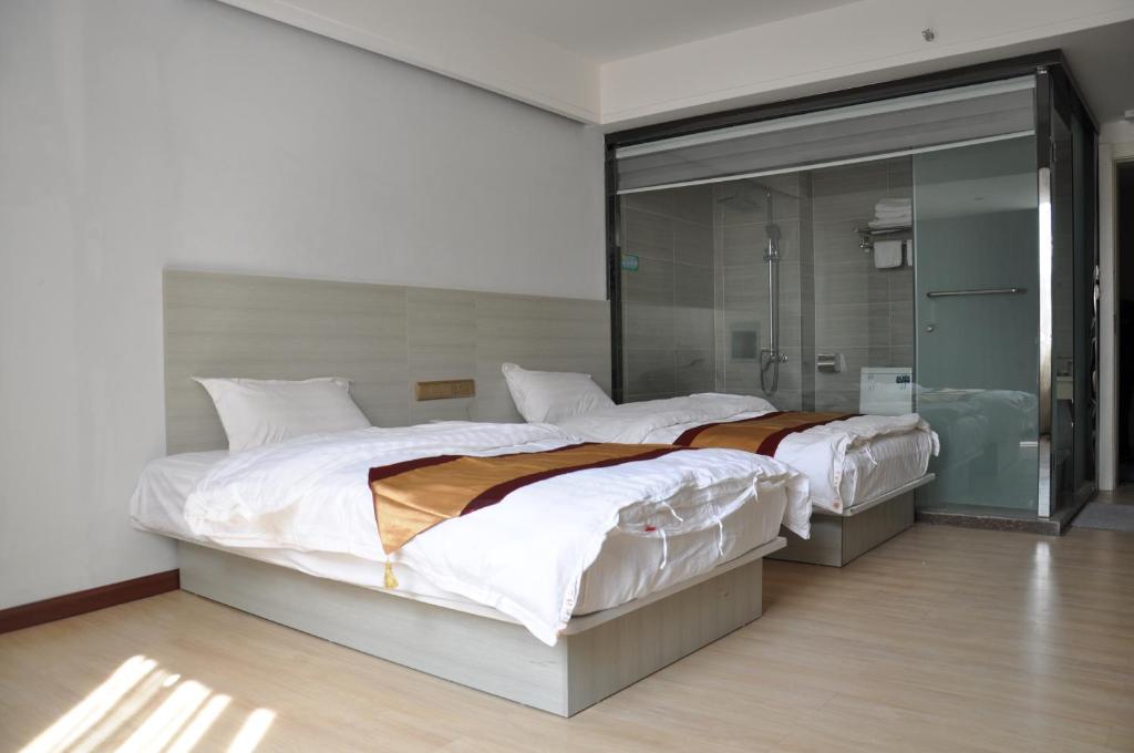 Postel nebo postele na pokoji v ubytování Juli Boutique Hotel