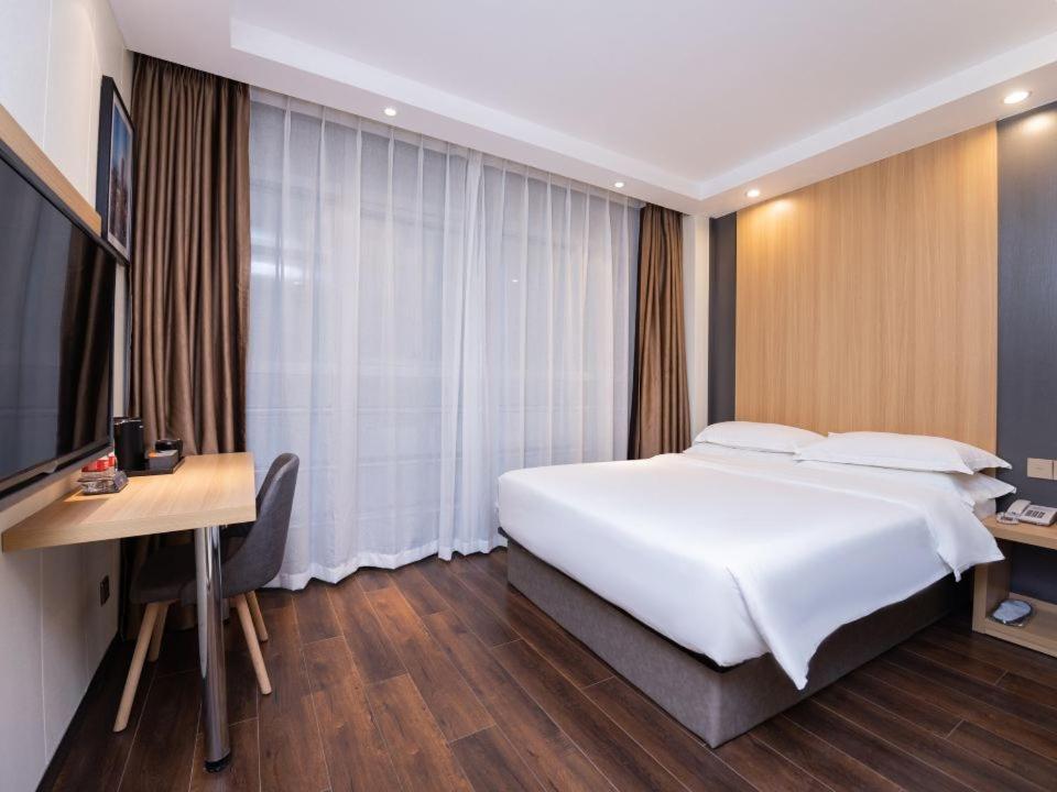 TV a/nebo společenská místnost v ubytování Country Inn&Suites by Radisson, Shanghai PVG