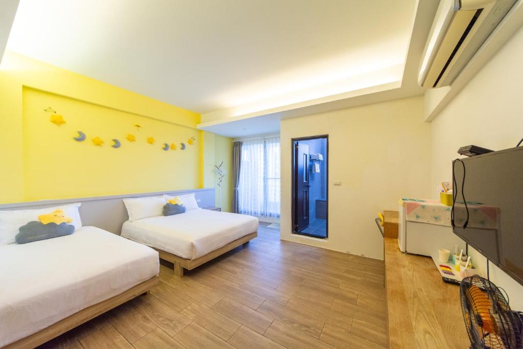 Postel nebo postele na pokoji v ubytování Ting Shuan B B&B