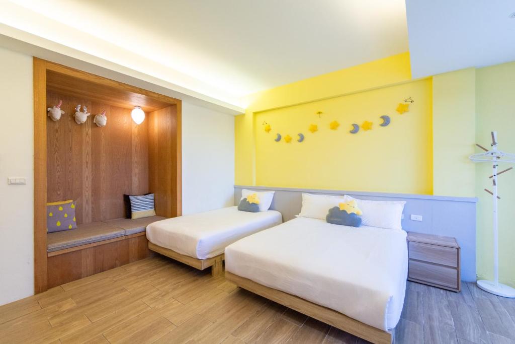 Postel nebo postele na pokoji v ubytování Ting Shuan B B&B