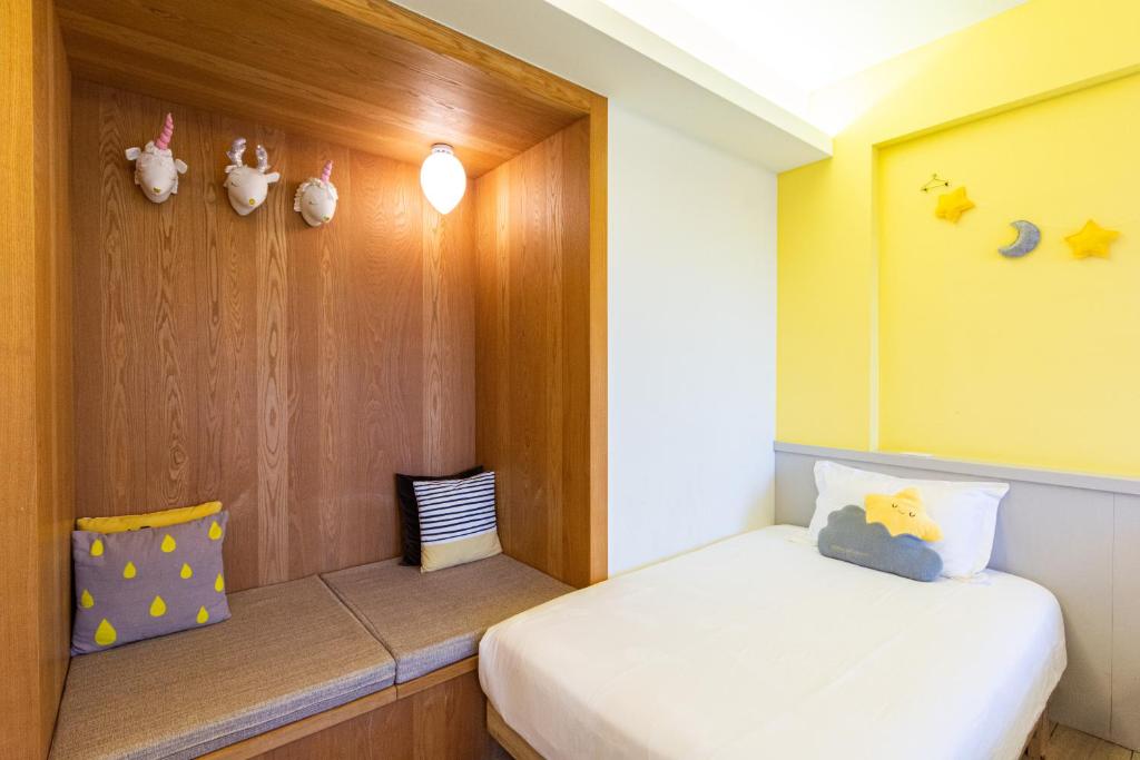 Postel nebo postele na pokoji v ubytování Ting Shuan B B&B