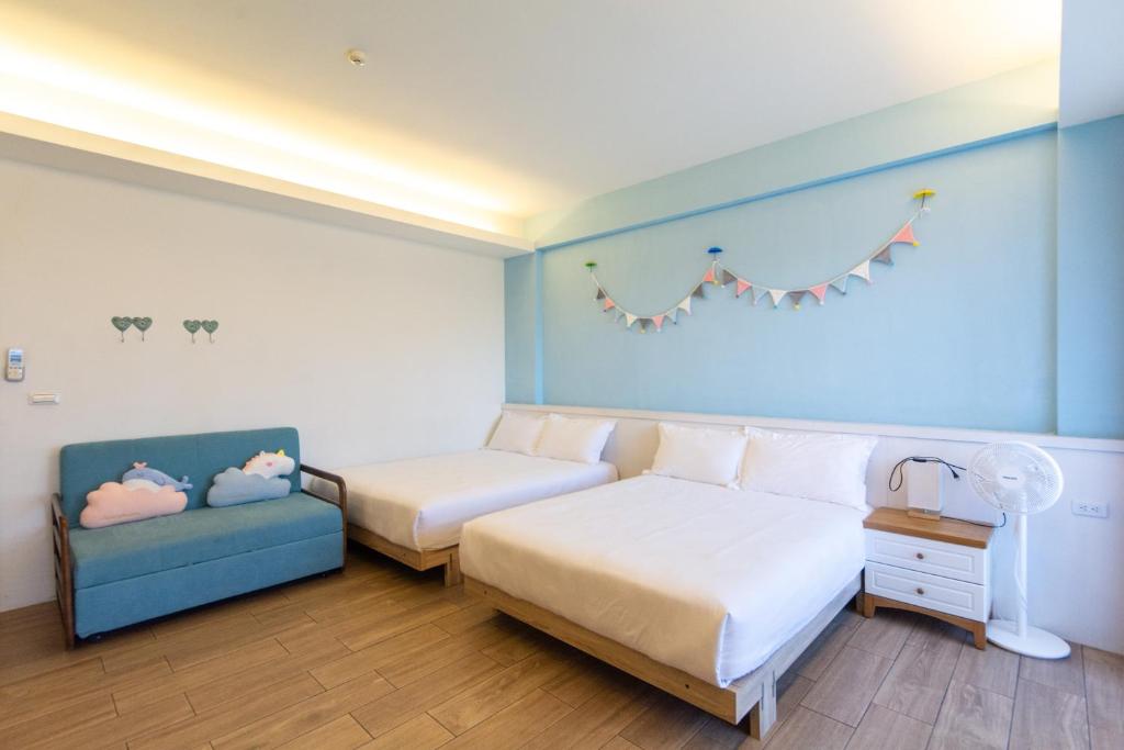 Postel nebo postele na pokoji v ubytování Ting Shuan B B&B