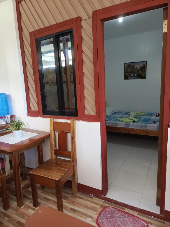 Postel nebo postele na pokoji v ubytování Kennie's Homestay