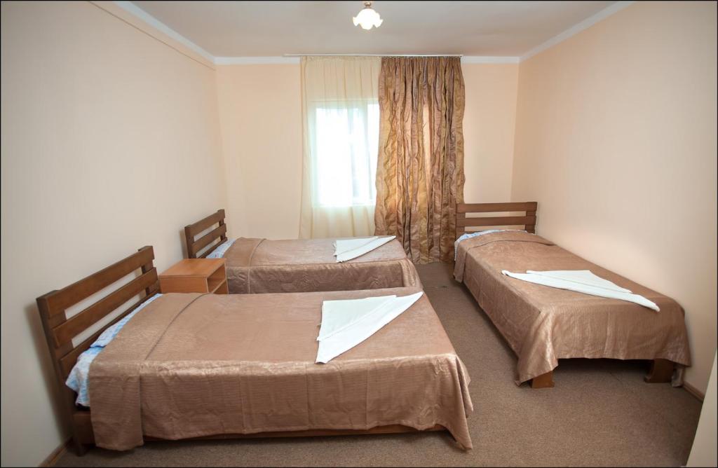 Кровать или кровати в номере Hotel Premium