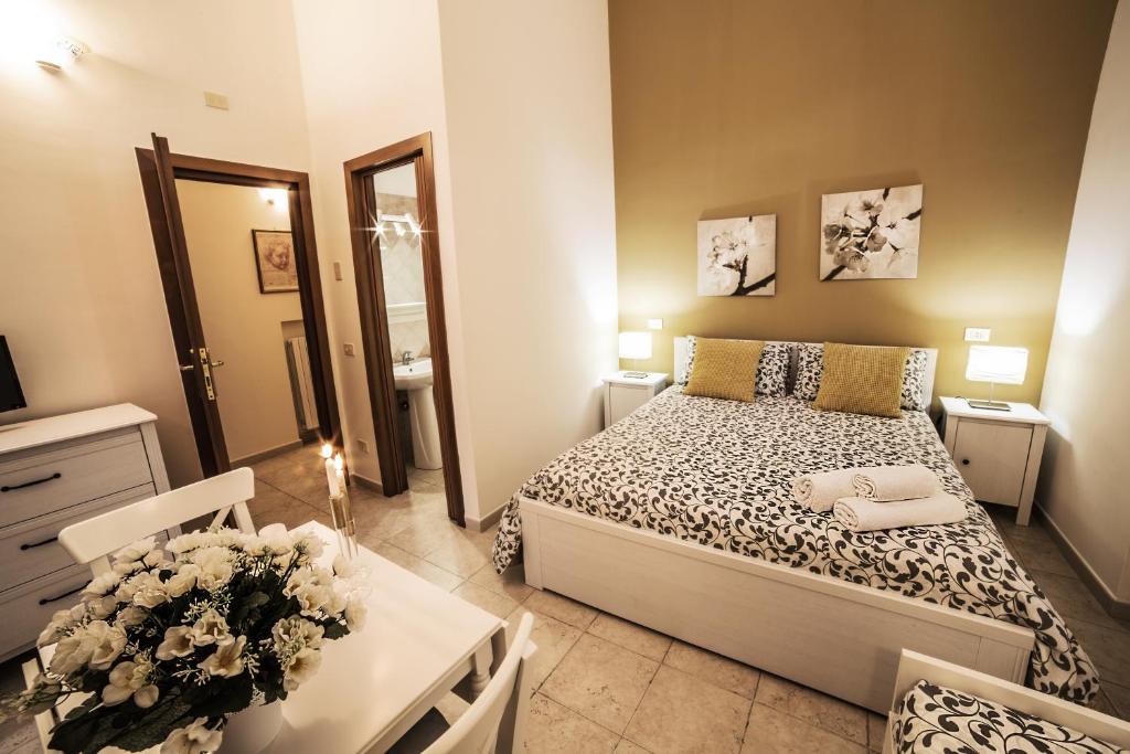 Posteľ alebo postele v izbe v ubytovaní B&B Germinario