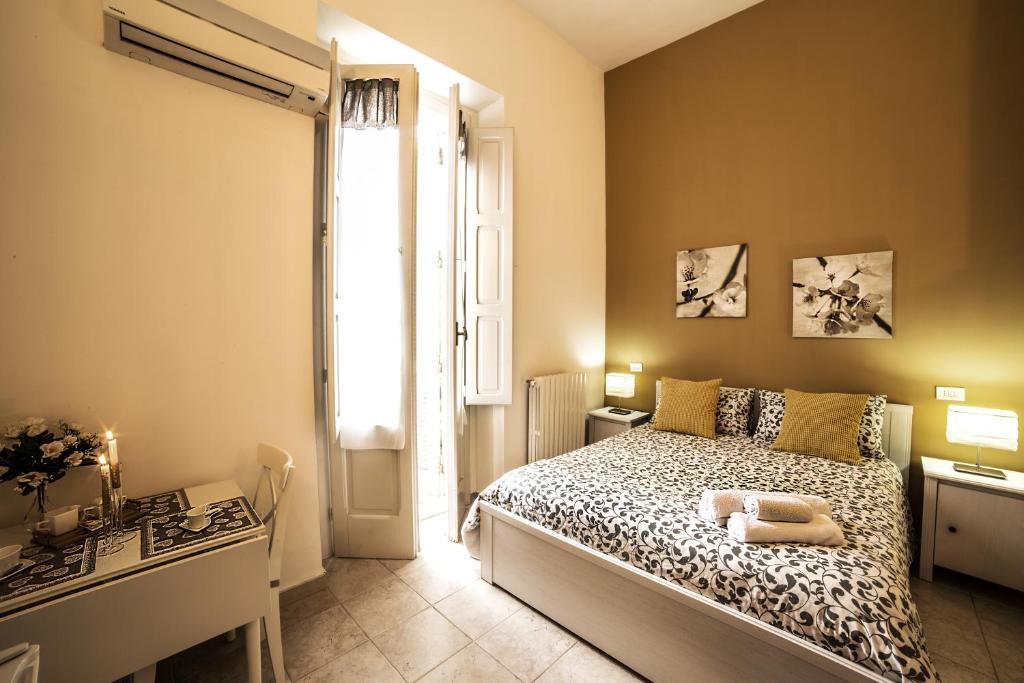 Posteľ alebo postele v izbe v ubytovaní B&B Germinario