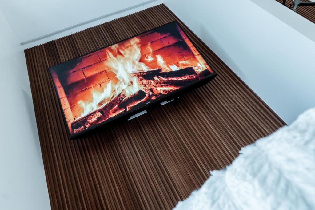 TV a/nebo společenská místnost v ubytování Ram7 Lux Charmant Apartment Gallarate