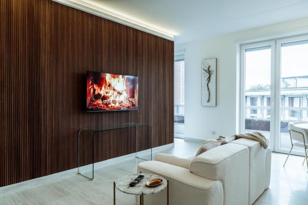 TV a/nebo společenská místnost v ubytování Ram7 Lux Charmant Apartment Gallarate