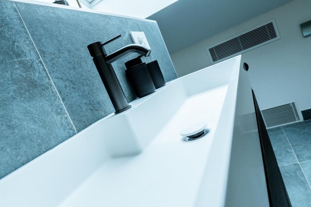 Koupelna v ubytování Ram7 Segredo Ultrassecreto Apartment Gallarate