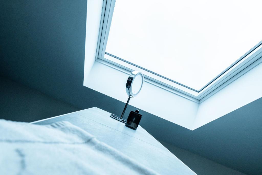 Postel nebo postele na pokoji v ubytování Ram7 Segredo Ultrassecreto Apartment Gallarate