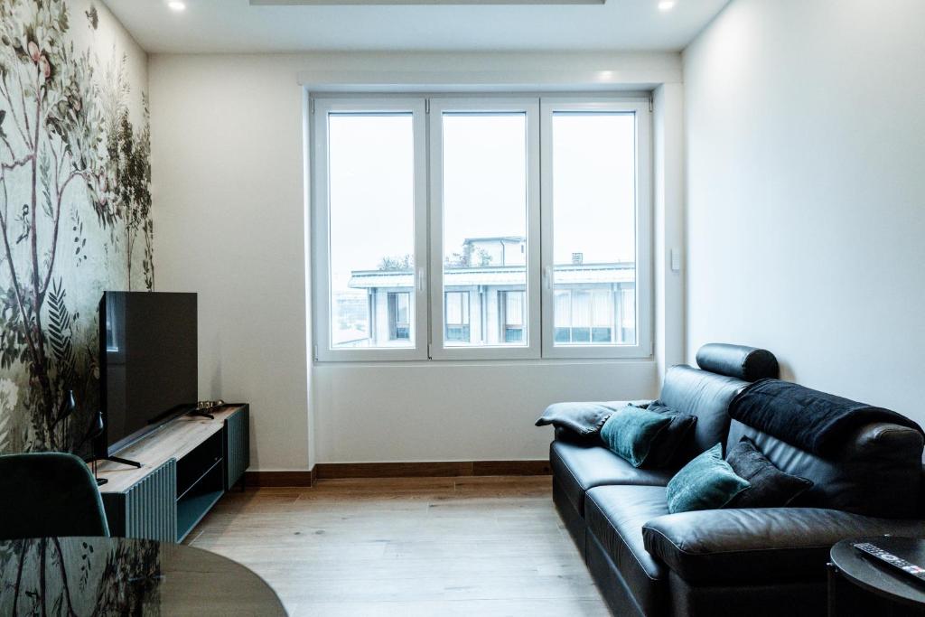 Posezení v ubytování Ram7 Segredo Ultrassecreto Apartment Gallarate