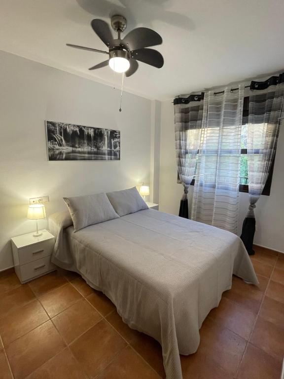 Posteľ alebo postele v izbe v ubytovaní Apartamento en Cazorla con vistas espectaculares