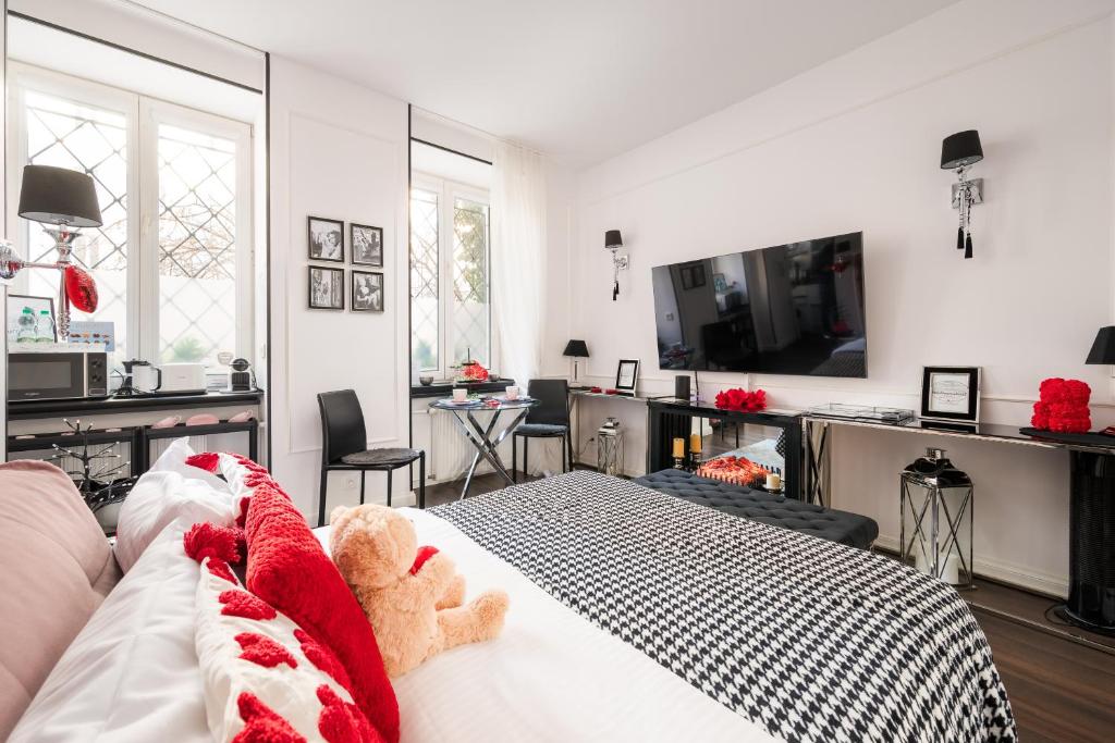 Televízia a/alebo spoločenská miestnosť v ubytovaní Premium Apart Varsovia Alice 2