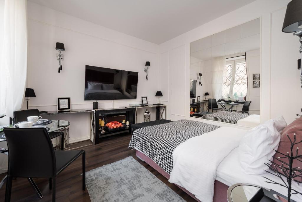 Posteľ alebo postele v izbe v ubytovaní Premium Apart Varsovia Alice 2