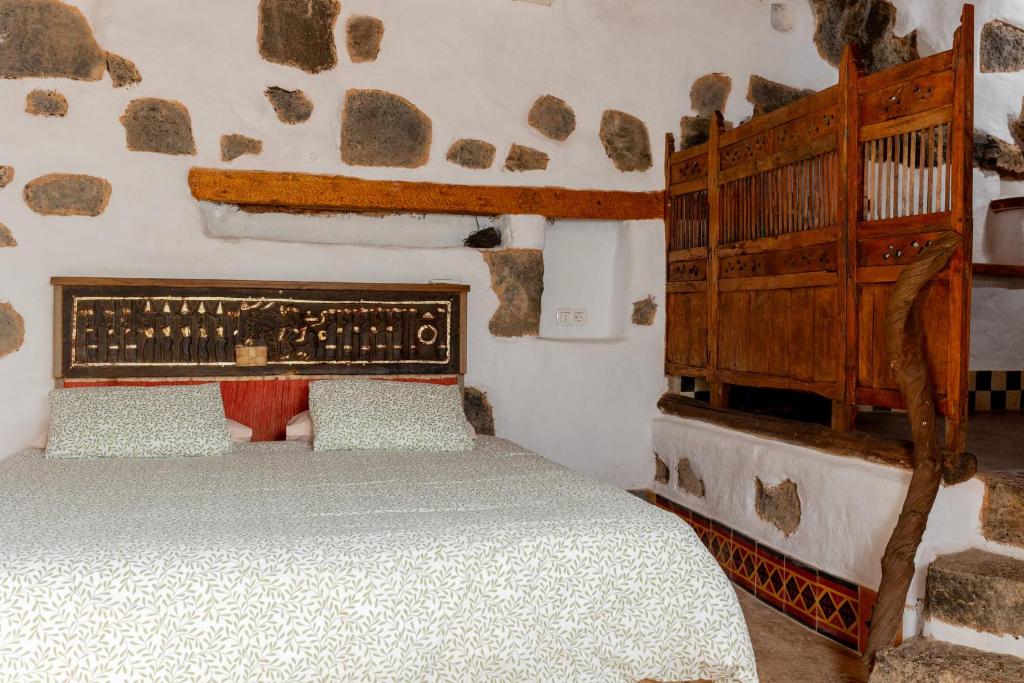 Postel nebo postele na pokoji v ubytování Finca Tomaren