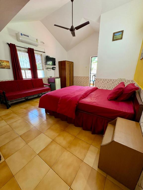 Postel nebo postele na pokoji v ubytování Jes Guest House