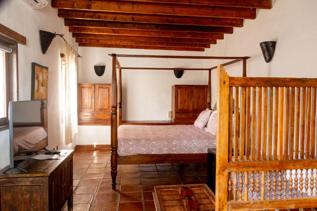 Postel nebo postele na pokoji v ubytování Finca Tomaren