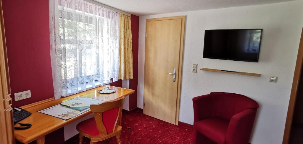TV a/nebo společenská místnost v ubytování Hotel Zum Bürgergarten