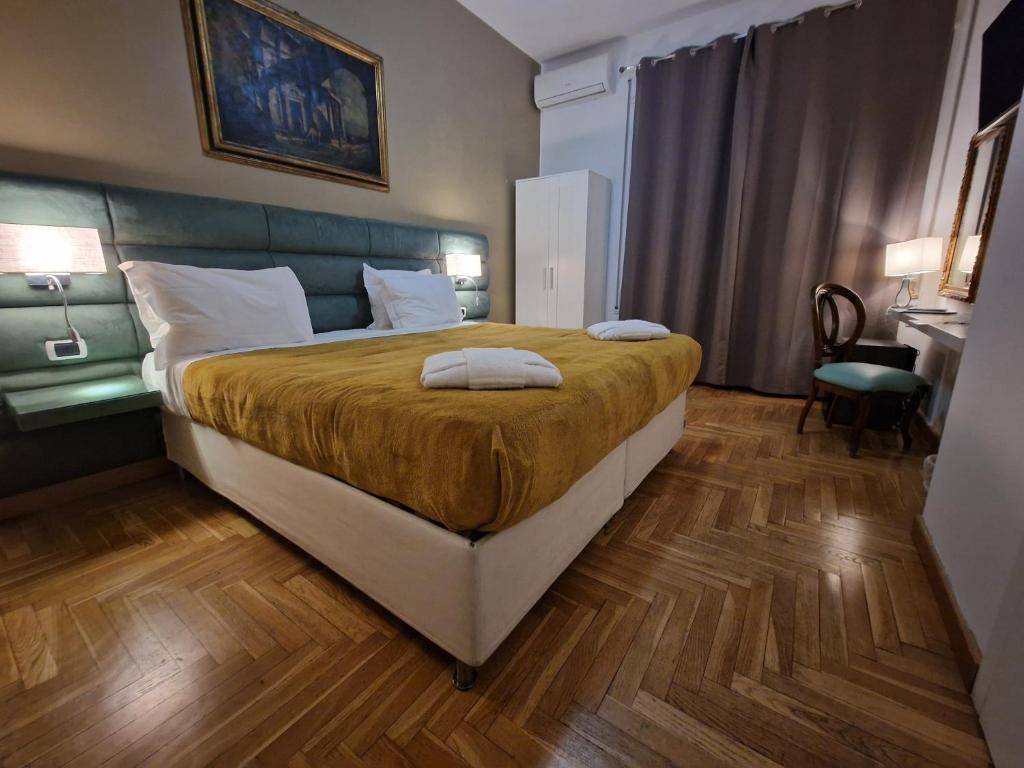 Posteľ alebo postele v izbe v ubytovaní Sweet Home Parioli