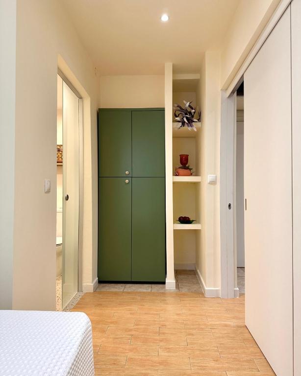 Postel nebo postele na pokoji v ubytování Αλσύλλιο - Alsillio studio apartments