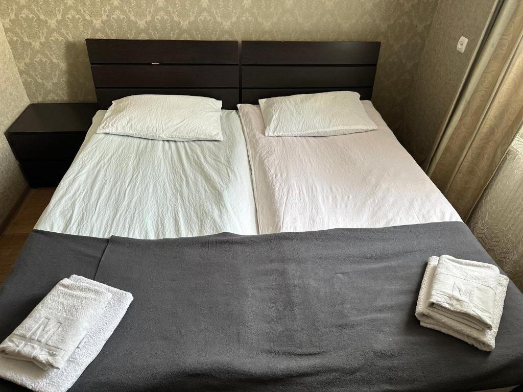 Postel nebo postele na pokoji v ubytování Guest house chavchavadze N23