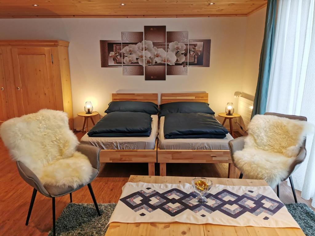 Postel nebo postele na pokoji v ubytování Strickerhof