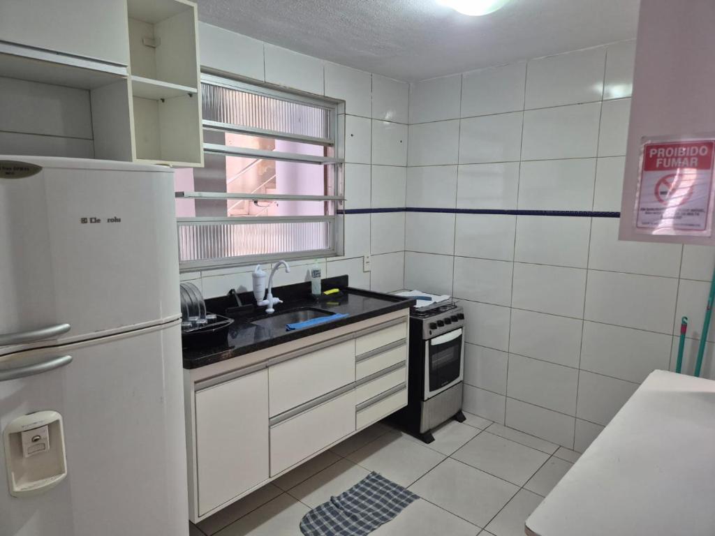 Kuchyň nebo kuchyňský kout v ubytování Sossai Hostel Flats