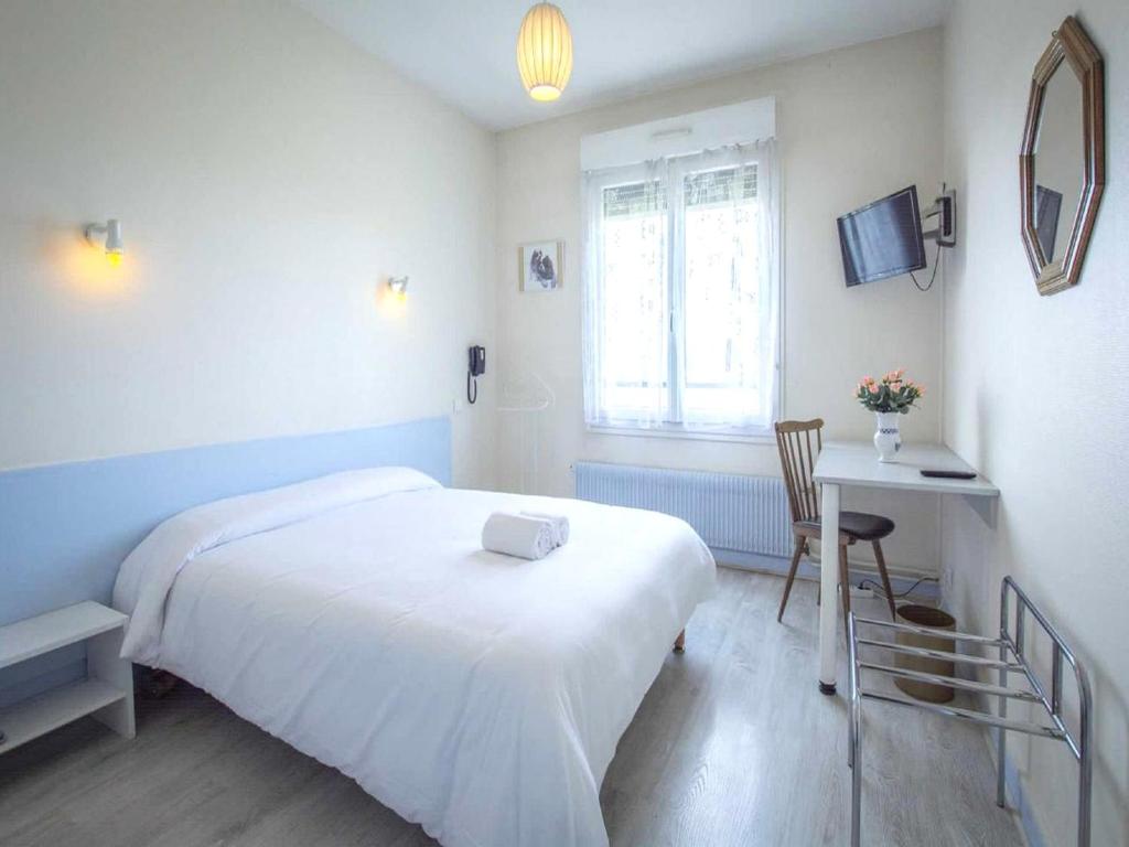 Postel nebo postele na pokoji v ubytování Le Relais de la route bleue