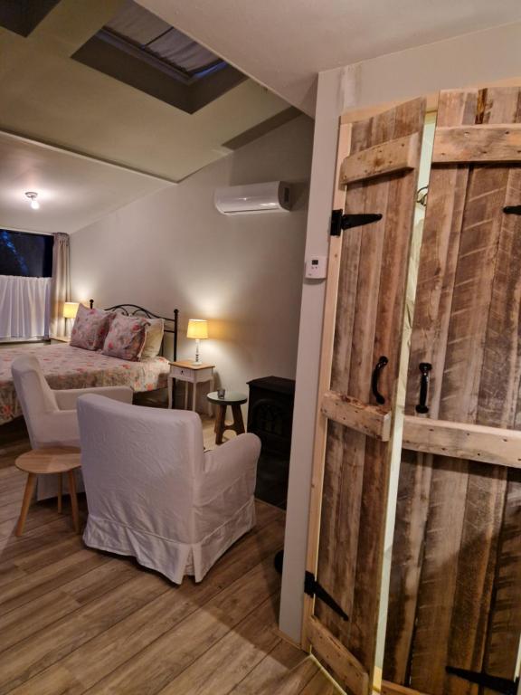 Postel nebo postele na pokoji v ubytování BenB Op de Vleet vrijstaande accommodatie