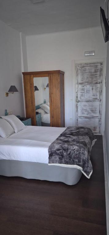 Posteľ alebo postele v izbe v ubytovaní Hotel Lanjaron