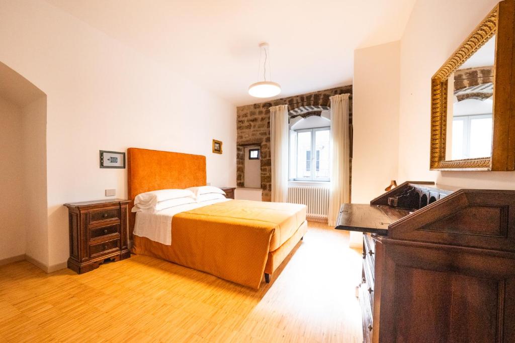 Ένα ή περισσότερα κρεβάτια σε δωμάτιο στο Roberto - CASA VACANZE BALDASSINI N 15