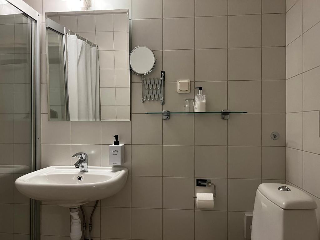 Koupelna v ubytování Injoy Compact Hotel Solna