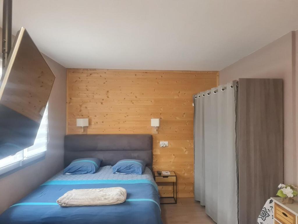 Postel nebo postele na pokoji v ubytování Gîte Le Canaillou
