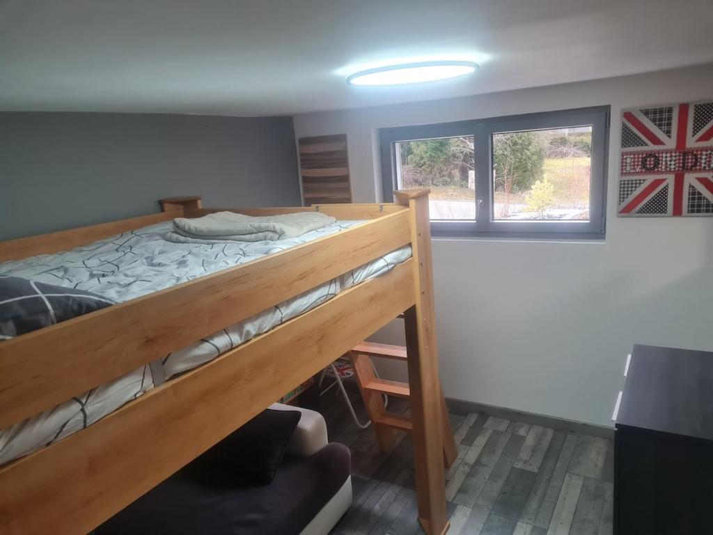 Postel nebo postele na pokoji v ubytování Gîte Le Canaillou