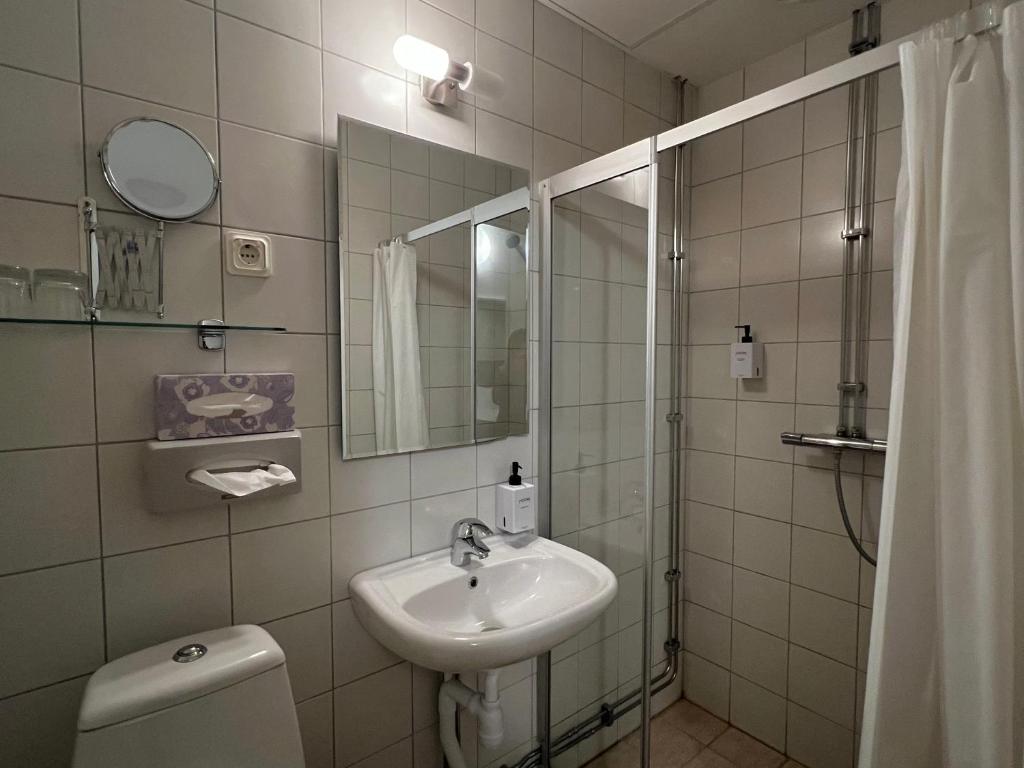 Koupelna v ubytování Injoy Compact Hotel Solna