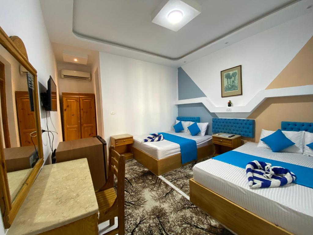 Postel nebo postele na pokoji v ubytování Seaview Hotel Dahab