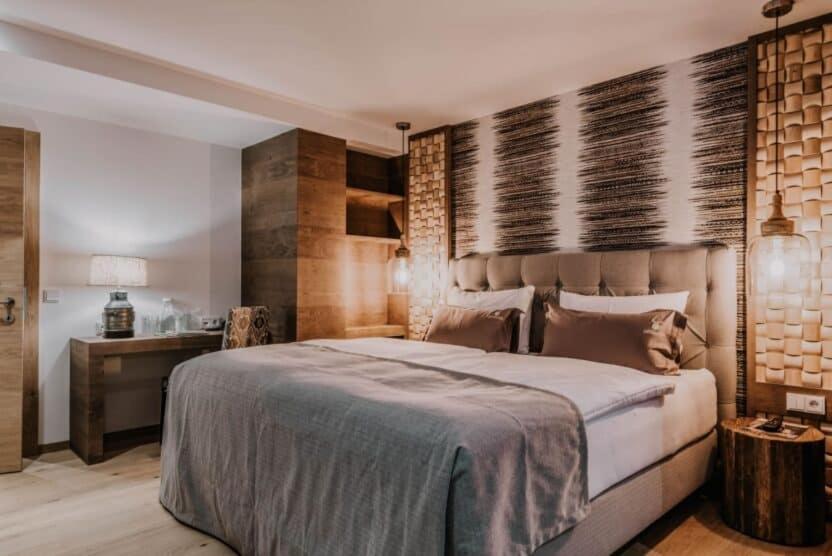 Postel nebo postele na pokoji v ubytování Hotel Oberforsthof