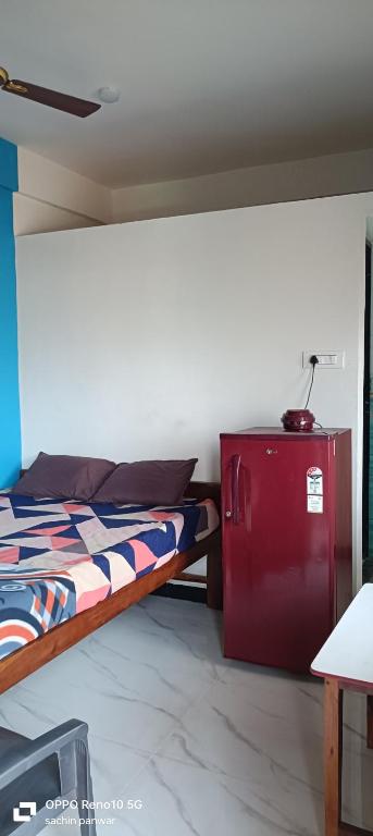 Postel nebo postele na pokoji v ubytování Chillies Guest House